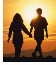 Couple walking together in the sunset